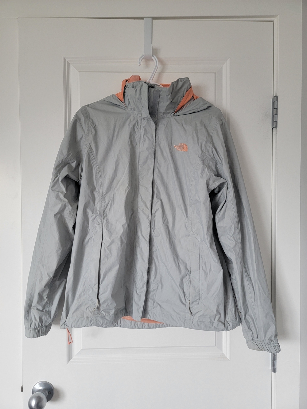 The North Face Light Gray Rain Jacket with Peach Accents